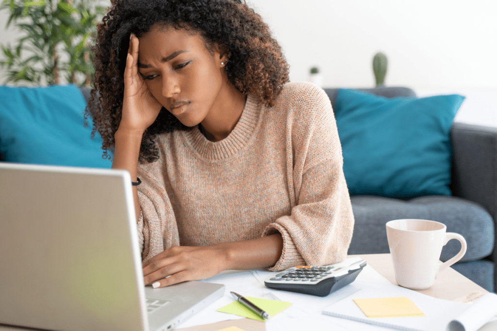 Woman stressed about the lack of automations for her online business.