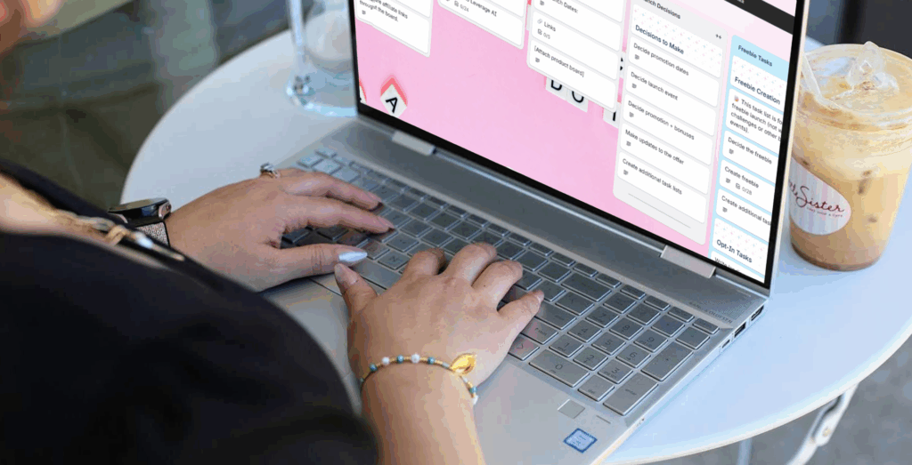Entrepreneur using Trello on a laptop for business demonstrating how to follow through with plans and illustrating business systems that turn ideas into execution to make follow through easier.